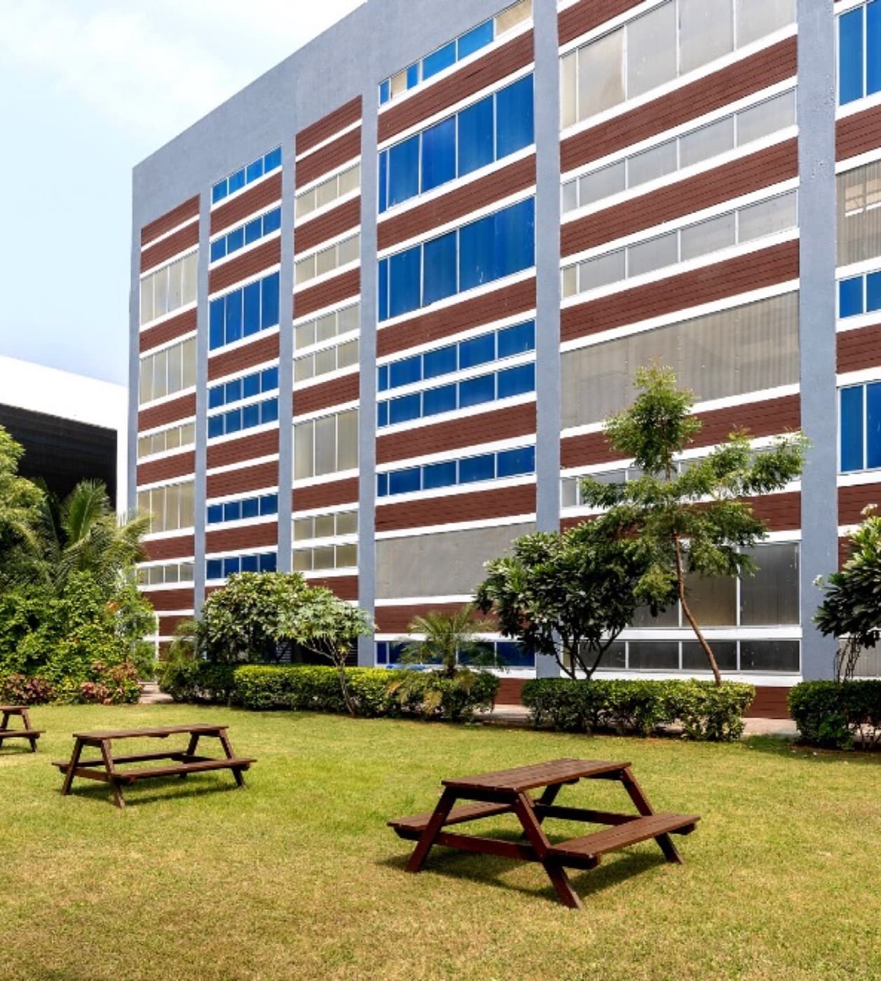 Shanti Business School campus building and lawns in Shela, Ahmedabad